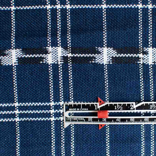 Blue checkered fabric with a ruler for scale