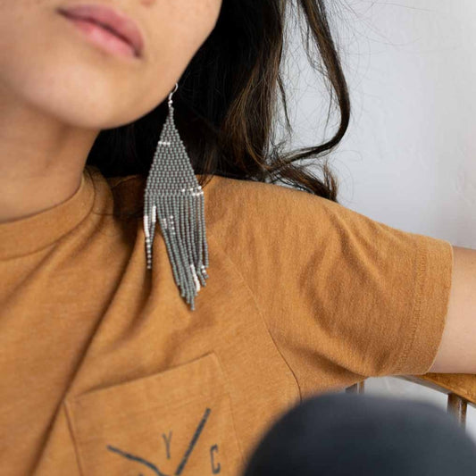 Beaded fringe earrings with minimalistic design.