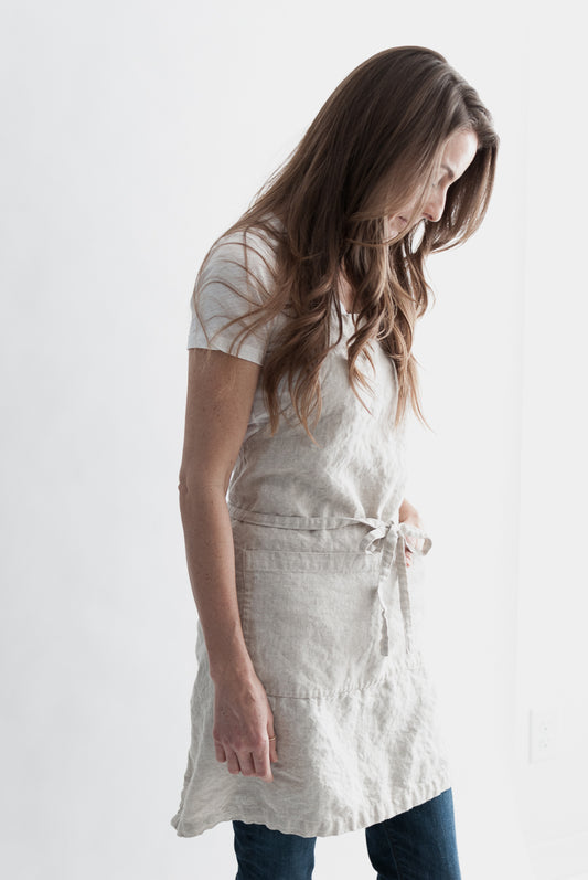 natural linen apron on woman