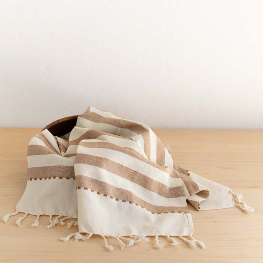 fair trade hand towel in tan wide striped