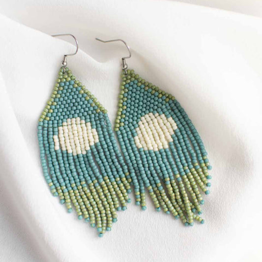 Beaded earrings with turquoise blue and green seed beads and a circle design.