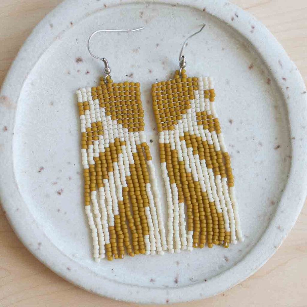 Beaded earrings with golden sun pattern