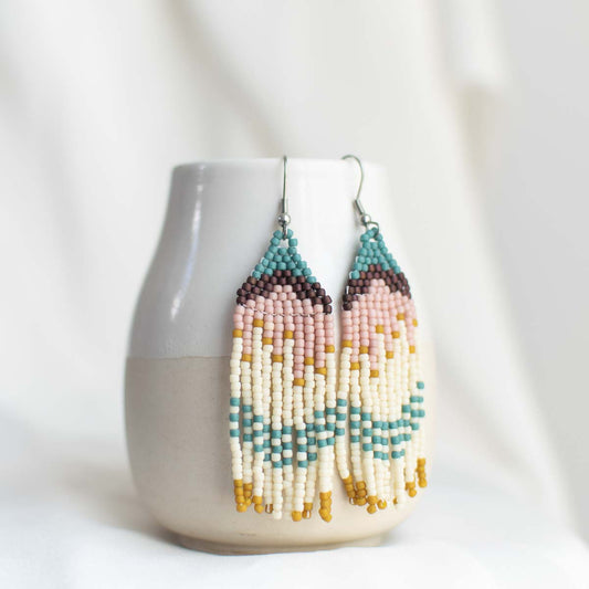 Beaded earrings with fringe.
