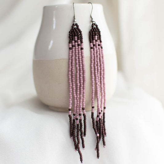 Long beaded fringe earrings in purple.