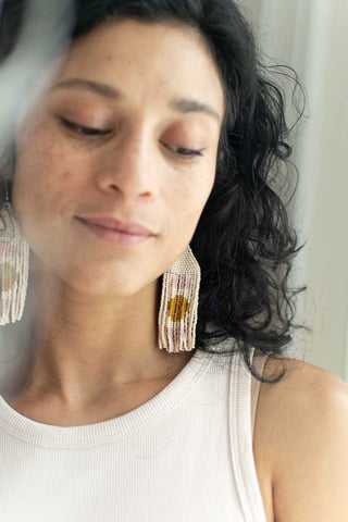 women wearing fair trade mimimal fringe earrings