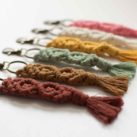 A closeup of diamond pattern on macrame keychains.
