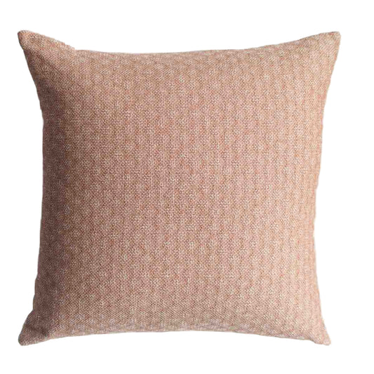 Textured brown pillow on a white background