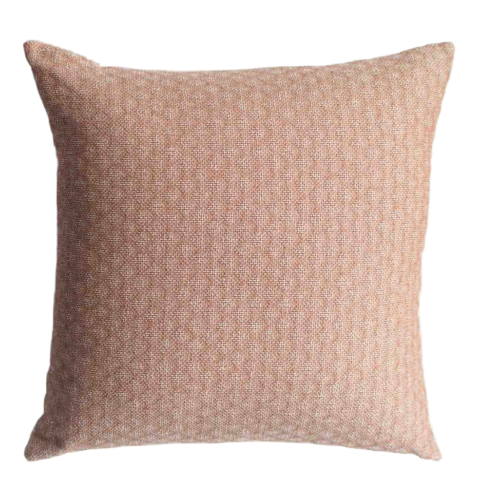 Textured brown pillow on a white background