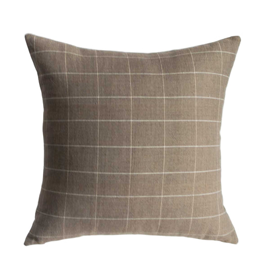 Plaid patterned pillow on a white background