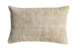 Beige textured pillow on a white background