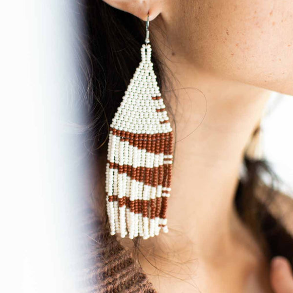 fair trade beaded earrings in cinnamon and off white