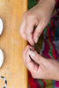 mayan kaqchikel female artisan hands making