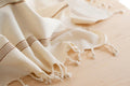 twisted fringe on woven hand towel