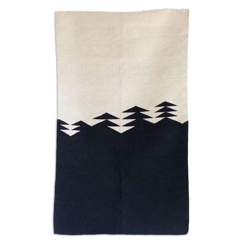 black and beige wool rug