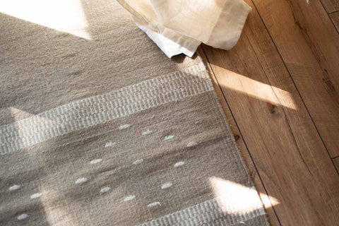 tan wool rug