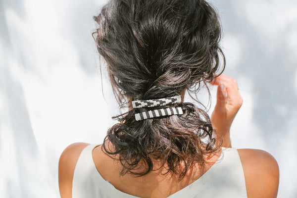 woman wearing fair trade striped hair accessories