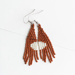 Beaded earrings in terra cotta.