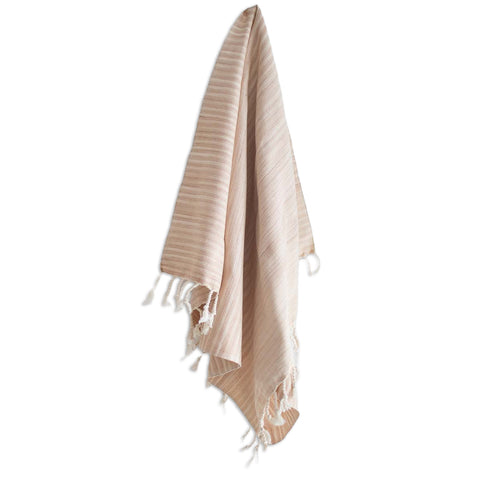handwoven hand towel with twisted fringe on white background