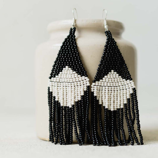Beaded fringe earrings with minimalistic design.