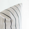 Striped black and beige woven pillow cover